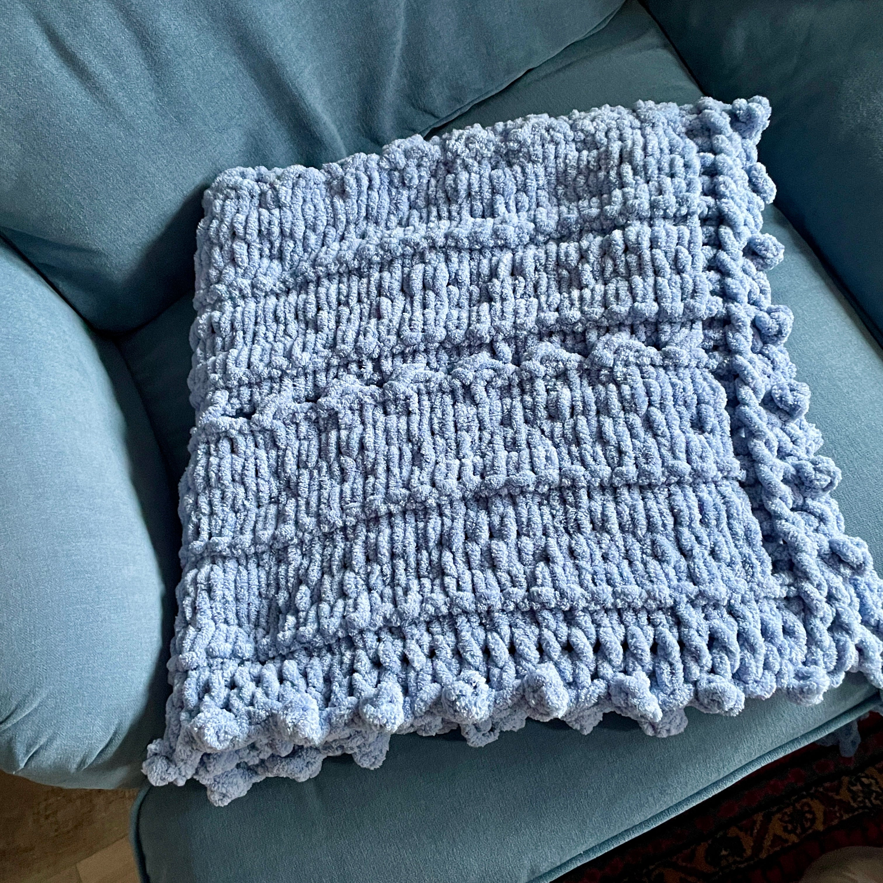 Pom pom baby blanket best sale knitting pattern